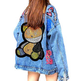 Chaqueta vaquera con estampado de osos e inscripciones